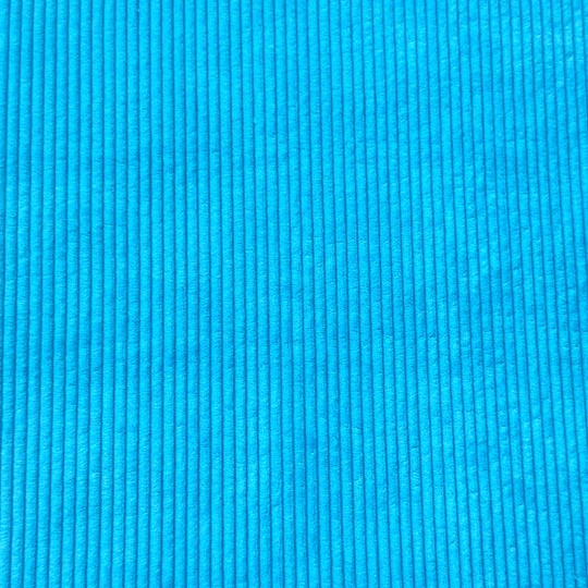 Tissus velours côtelés huggy bleu turquoise